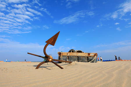 Rusty anchors against the blue skyの写真素材