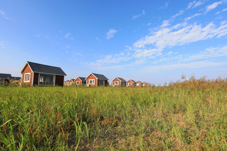 The wooden house in the background of blue skyのeditorial素材