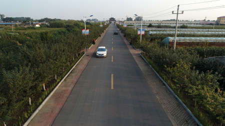 Vehicles and pedestrians on rural roads, North Chinaのeditorial素材
