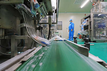 LUANNAN COUNTY, Hebei Province, China-October 15, 2020: The workers work on the salt packing line