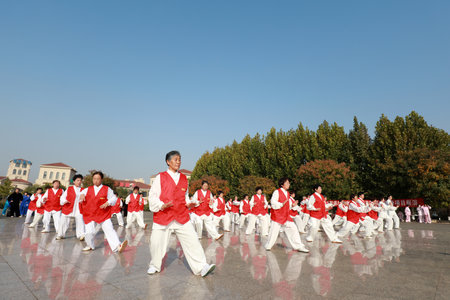 LUANNAN COUNTY, Hebei Province, China-October 18, 2020: People are practicing Taijiquan in the squareのeditorial素材