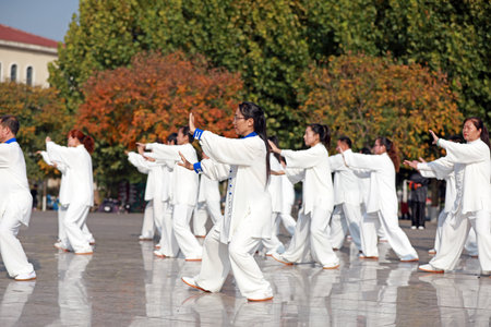 LUANNAN COUNTY, Hebei Province, China-October 18, 2020: People are practicing Taijiquan in the squareのeditorial素材