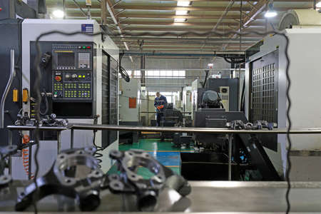 LUANNAN COUNTY, Hebei Province, China-September 29, 2020: Workers work hard on the production line of automobile safety systemのeditorial素材