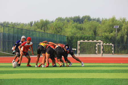 LUANNAN COUNTY, Hebei Province, China-August 23, 2020: rugby players train on the playgroundのeditorial素材