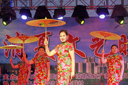LUANNAN COUNTY, China - August 30, 2018: Cheongsam show on stage, LUANNAN COUNTY, Hebei Province, Chinaのeditorial素材