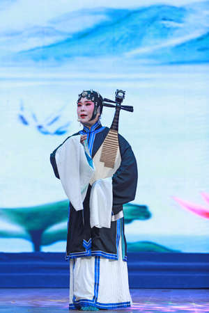 LUANNAN COUNTY, Hebei Province, China - November 17, 2019: Chinese Pingju performance on stage.のeditorial素材