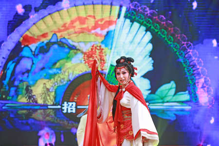 LUANNAN COUNTY, Hebei Province, China - December 30, 2019: Chinese traditional folk dance performance on stage.のeditorial素材