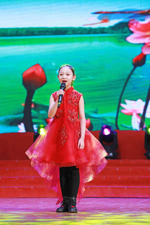 LUANNAN COUNTY, Hebei Province, China - January 1, 2020: Chinese children's songs on stage.のeditorial素材