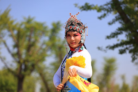 LUANNAN COUNTY, Hebei Province, China - May 2, 2019: People are wearing beautiful clothes and doing Yangko.のeditorial素材