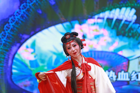 LUANNAN COUNTY, Hebei Province, China - December 30, 2019: Chinese traditional folk dance performance on stage.のeditorial素材