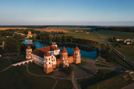 Mir castle with spires near the lake top view in Belarus near the city of Mir.のeditorial素材