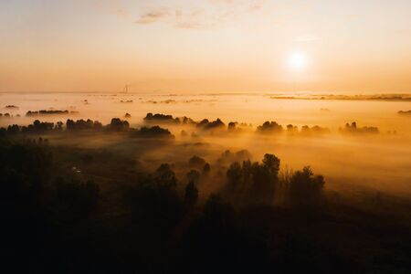 amazing sunrise in the countryside over forest expanses and fields. Amazing dawn in Ukraine and heights.Taking photos from a nature quadcopter.の写真素材