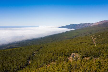 Cloud sea under mount Teide in Tenerife, aerial View over clouds on the island of Tenerife. Canary...