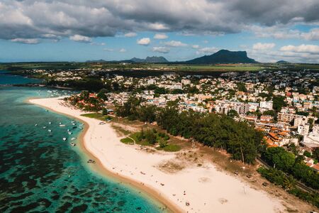 On the beautiful beach of the island of Mauritius along the coast. Shooting from a bird's eye view...