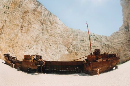 curved ship on Zakynthos island, Greece Navagio beach, or shipwreck beach,sometimes called smugglers ' Bay , on the coast of Zakynthos island, in the Ionian Islands of Greeceの写真素材
