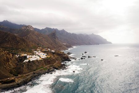 Rough rocky cliffs in the North of Tenerife. Beautiful Benijo beach in the Canary Islands. Rocks,...
