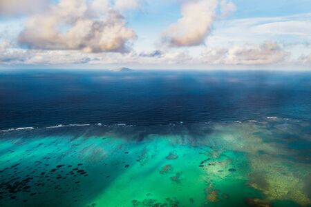 Aerial picture of the north, north east coast of Mauritius Island. Beautiful lagoon of Mauritius Island shot from aboveの写真素材