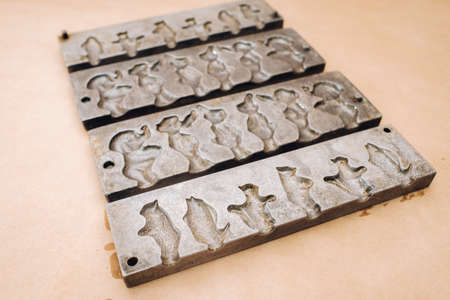 Forms for making sugar lollipops.A taste of our childhood.Rooster lollipops.Sugar caramelの写真素材