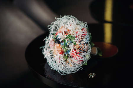 Wedding bouquet unusual modern.Wedding ring.Wedding ring.Wedding.Holiday Floristics