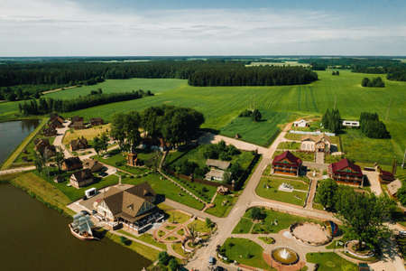 view from the height of the Lake in a green field in the form of a horseshoe and a village in the...