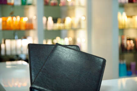 The book of entries in the beauty salon. Log of offers at the reception.