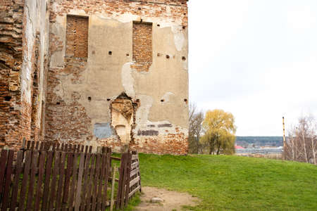 the ruins of the facade of an abandoned ruined building of an ancient castle of the 18th century.Belarus.の写真素材