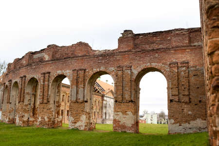 the ruins of the facade of an abandoned ruined building of an ancient castle of the 18th century.Belarus.の写真素材