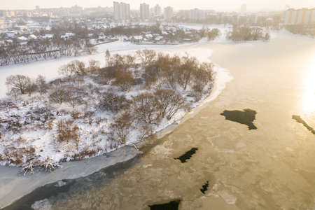 Winter river Svisloch and a settlement in the center of Minsk. Belarus.の写真素材