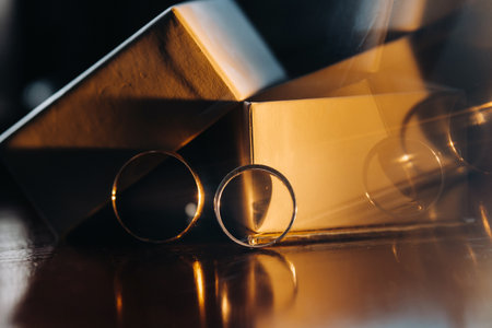 Close-up of two gold wedding rings for a wedding.の写真素材