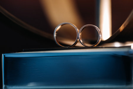 Close-up of two gold wedding rings for a wedding.の写真素材