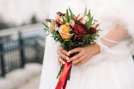 wedding bouquet in the hands of the bride.The decor at the wedding.の写真素材
