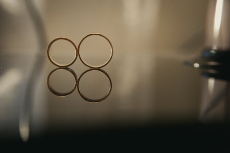 Close-up of two gold wedding rings for a wedding.の写真素材