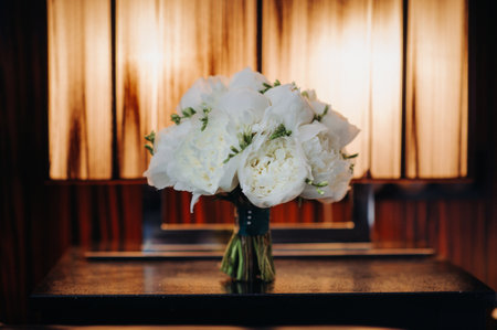 wedding bouquet with peonies at the wedding.Beautiful bouquet of flowers.の写真素材