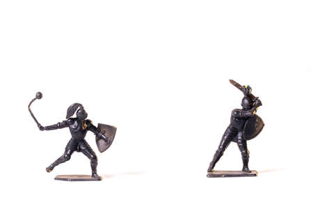 Vintage toys black knights isolated on white background.