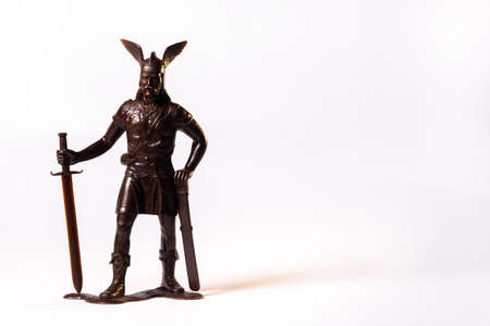 Vintage toy brown Viking soldier isolated on white background.の写真素材