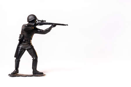 Vintage toy black soldier isolated on white background.の写真素材