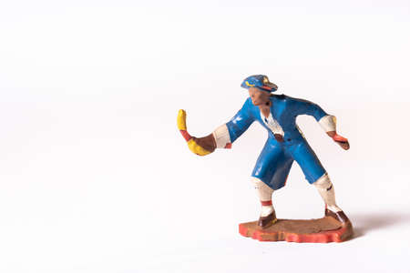 Vintage pirate toys isolated on white background.の写真素材
