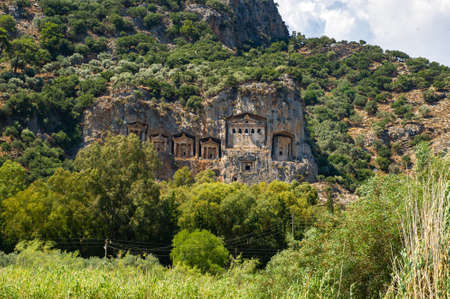 Famous Lycian Tombs of ancient Caunos city, Dalyan, Turkey.の写真素材