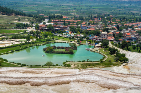 Lake and natural carbonate formations on a mountain in Pamukkale, Turkey.の写真素材