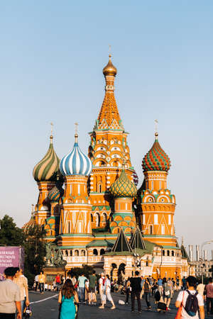 June 6, 2019. Red Square, Moscow, Russia. Kremlin towers and tourists on Red Square at sunset in...