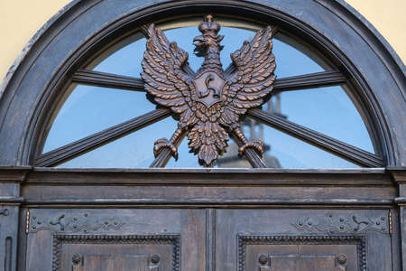 July 8, 2021 Nesvizh, Belarus The coat of arms of the Radziwills over the door of the Nesvizh Castle.のeditorial素材