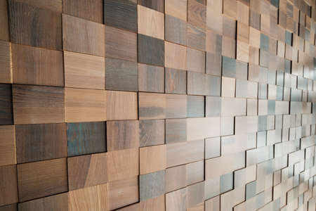 Background of many wooden cubes. Wooden texture for inserting inscriptions and text.
