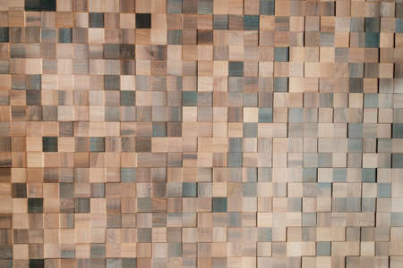 Background of many wooden cubes. Wooden texture for inserting inscriptions and text.
