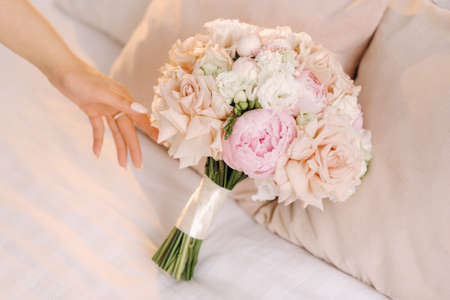 Wedding bouquet of roses lying on the surface. wedding floristry.の写真素材