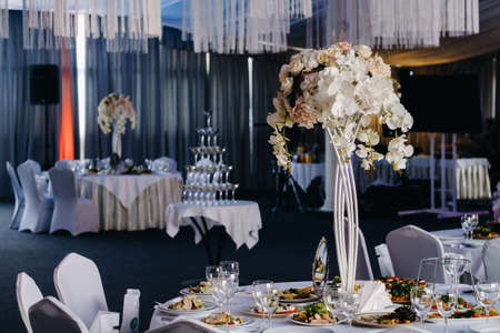 Decorated Table for a wedding reception in a restaurant .Wedding decor.