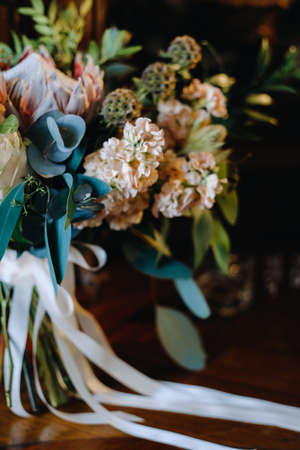 Wedding bouquet of roses lying on the surface. wedding floristry.の写真素材
