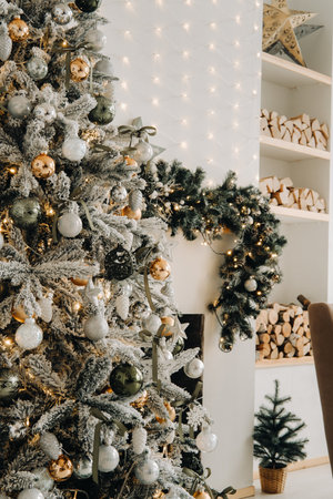 Christmas tree close-up. On New years eve, a decorated snow-covered Christmas tree.の写真素材