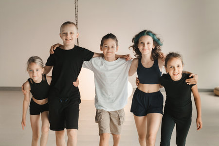 Portrait of a group of children in the fitness room. Children's yoga.の写真素材