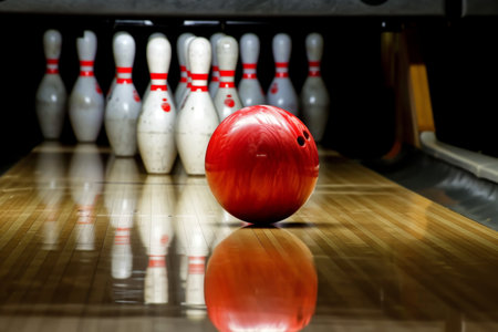 The bowling ball flies into the skittles. Bowling.の素材