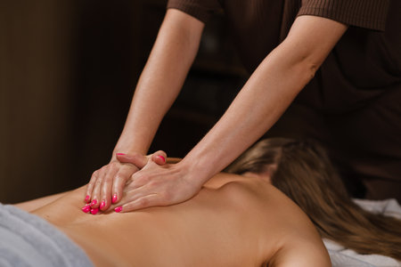 Relaxing massage session at a wellness center, providing relief and rejuvenation on a calm afternoonの写真素材